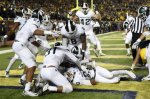Jalen Watts-Jackson spoiled Michigan's potential upset, by recovering fumble from a muffed snap. (Melanie Maxwell/Ann Arbor News)