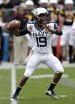 This is a rare shot of Navy's QB, Keenan Reynolds, actually throwing, who is closing in on Montee Ball's single-season TD record. (AP Photo File)